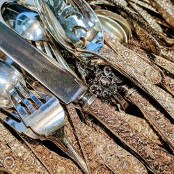 sell silver flatware forks being melted in Las Vegas by silverware buyers